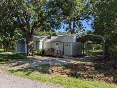 Enjoy a reasonably priced lake home in popular Arrowhead Estates on Arrowhead State Park Golf Course in Oklahoma - for sale on GolfHomes.com, golf home, golf lot
