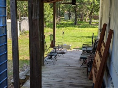Enjoy a reasonably priced lake home in popular Arrowhead Estates on Arrowhead State Park Golf Course in Oklahoma - for sale on GolfHomes.com, golf home, golf lot