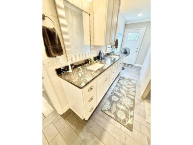 Fully remodeled, all-electric home with nearly 5,000 sq ft of on The Course at River Oaks in Arkansas - for sale on GolfHomes.com, golf home, golf lot