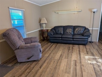 Enjoy a reasonably priced lake home in popular Arrowhead Estates on Arrowhead State Park Golf Course in Oklahoma - for sale on GolfHomes.com, golf home, golf lot