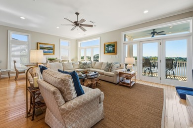 Enjoy breathtaking panoramic views of the marsh, estuary, and on DeBordieu Country Club in South Carolina - for sale on GolfHomes.com, golf home, golf lot