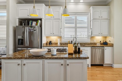 Enjoy breathtaking panoramic views of the marsh, estuary, and on DeBordieu Country Club in South Carolina - for sale on GolfHomes.com, golf home, golf lot