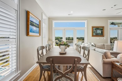 Enjoy breathtaking panoramic views of the marsh, estuary, and on DeBordieu Country Club in South Carolina - for sale on GolfHomes.com, golf home, golf lot