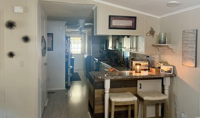 2 bedroom 2 bath renovated and very well maintained home located on Indigo Creek Golf Club in South Carolina - for sale on GolfHomes.com, golf home, golf lot