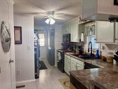 2 bedroom 2 bath renovated and very well maintained home located on Indigo Creek Golf Club in South Carolina - for sale on GolfHomes.com, golf home, golf lot