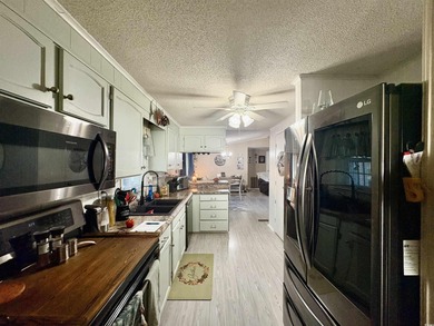 2 bedroom 2 bath renovated and very well maintained home located on Indigo Creek Golf Club in South Carolina - for sale on GolfHomes.com, golf home, golf lot