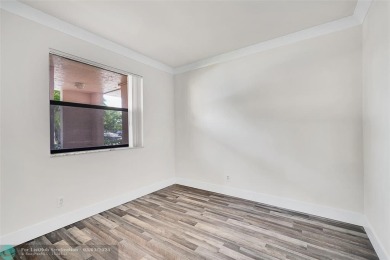 Totally remodeled 2/2 condo from top to bottom in Sunrise Lakes on Sunrise Lakes Phase IV Golf Course in Florida - for sale on GolfHomes.com, golf home, golf lot