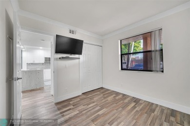 Totally remodeled 2/2 condo from top to bottom in Sunrise Lakes on Sunrise Lakes Phase IV Golf Course in Florida - for sale on GolfHomes.com, golf home, golf lot