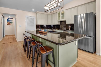 Completely remodeled and finished as of July 2025, this stunning on Saint Josephs Bay Country Club in Florida - for sale on GolfHomes.com, golf home, golf lot