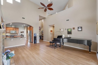 Luxury meets lifestyle in this stunning 3 bed, 3 bath, two-story on Tiger Point Golf and Country Club in Florida - for sale on GolfHomes.com, golf home, golf lot