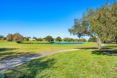 Majestically situated on the 15th hole of the most magnificent on TPC Eagle Trace in Florida - for sale on GolfHomes.com, golf home, golf lot