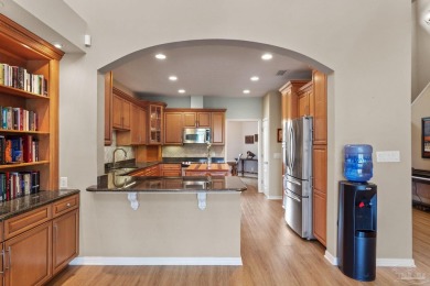 Luxury meets lifestyle in this stunning 3 bed, 3 bath, two-story on Tiger Point Golf and Country Club in Florida - for sale on GolfHomes.com, golf home, golf lot