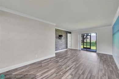 Totally remodeled 2/2 condo from top to bottom in Sunrise Lakes on Sunrise Lakes Phase IV Golf Course in Florida - for sale on GolfHomes.com, golf home, golf lot