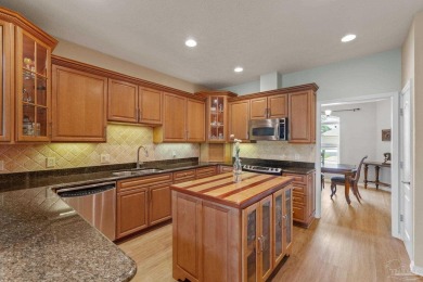 Luxury meets lifestyle in this stunning 3 bed, 3 bath, two-story on Tiger Point Golf and Country Club in Florida - for sale on GolfHomes.com, golf home, golf lot