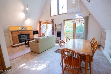Classic Pocono Lake chalet with endless potential! This on The Hideout Golf in Pennsylvania - for sale on GolfHomes.com, golf home, golf lot
