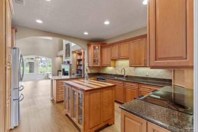Luxury meets lifestyle in this stunning 3 bed, 3 bath, two-story on Tiger Point Golf and Country Club in Florida - for sale on GolfHomes.com, golf home, golf lot