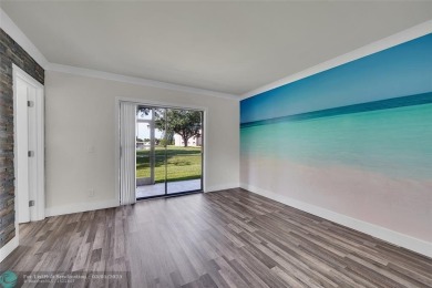 Totally remodeled 2/2 condo from top to bottom in Sunrise Lakes on Sunrise Lakes Phase IV Golf Course in Florida - for sale on GolfHomes.com, golf home, golf lot