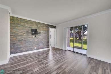 Totally remodeled 2/2 condo from top to bottom in Sunrise Lakes on Sunrise Lakes Phase IV Golf Course in Florida - for sale on GolfHomes.com, golf home, golf lot