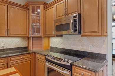 Luxury meets lifestyle in this stunning 3 bed, 3 bath, two-story on Tiger Point Golf and Country Club in Florida - for sale on GolfHomes.com, golf home, golf lot