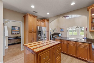 Luxury meets lifestyle in this stunning 3 bed, 3 bath, two-story on Tiger Point Golf and Country Club in Florida - for sale on GolfHomes.com, golf home, golf lot