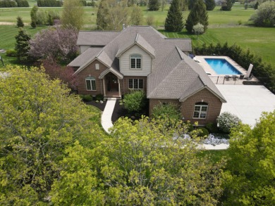 The builder of this 5,449 sq ft brick beauty thoughtfully on Greenville Country Club in Ohio - for sale on GolfHomes.com, golf home, golf lot