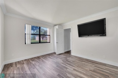 Totally remodeled 2/2 condo from top to bottom in Sunrise Lakes on Sunrise Lakes Phase IV Golf Course in Florida - for sale on GolfHomes.com, golf home, golf lot