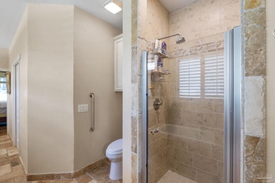 Luxury meets lifestyle in this stunning 3 bed, 3 bath, two-story on Tiger Point Golf and Country Club in Florida - for sale on GolfHomes.com, golf home, golf lot