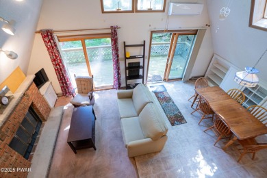Classic Pocono Lake chalet with endless potential! This on The Hideout Golf in Pennsylvania - for sale on GolfHomes.com, golf home, golf lot