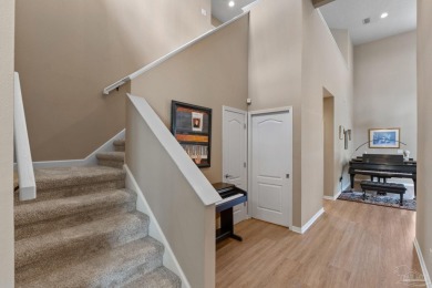 Luxury meets lifestyle in this stunning 3 bed, 3 bath, two-story on Tiger Point Golf and Country Club in Florida - for sale on GolfHomes.com, golf home, golf lot
