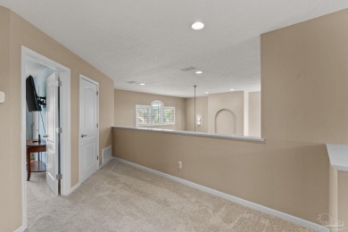 Luxury meets lifestyle in this stunning 3 bed, 3 bath, two-story on Tiger Point Golf and Country Club in Florida - for sale on GolfHomes.com, golf home, golf lot