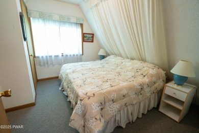 Classic Pocono Lake chalet with endless potential! This on The Hideout Golf in Pennsylvania - for sale on GolfHomes.com, golf home, golf lot