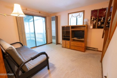 Classic Pocono Lake chalet with endless potential! This on The Hideout Golf in Pennsylvania - for sale on GolfHomes.com, golf home, golf lot