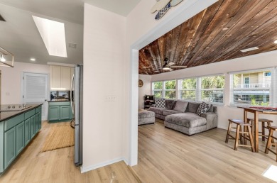 Completely remodeled and finished as of July 2025, this stunning on Saint Josephs Bay Country Club in Florida - for sale on GolfHomes.com, golf home, golf lot