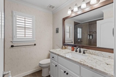 Luxury meets lifestyle in this stunning 3 bed, 3 bath, two-story on Tiger Point Golf and Country Club in Florida - for sale on GolfHomes.com, golf home, golf lot