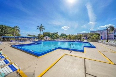 Totally remodeled 2/2 condo from top to bottom in Sunrise Lakes on Sunrise Lakes Phase IV Golf Course in Florida - for sale on GolfHomes.com, golf home, golf lot