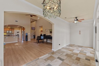 Luxury meets lifestyle in this stunning 3 bed, 3 bath, two-story on Tiger Point Golf and Country Club in Florida - for sale on GolfHomes.com, golf home, golf lot