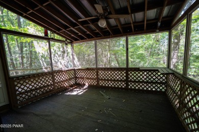 Classic Pocono Lake chalet with endless potential! This on The Hideout Golf in Pennsylvania - for sale on GolfHomes.com, golf home, golf lot