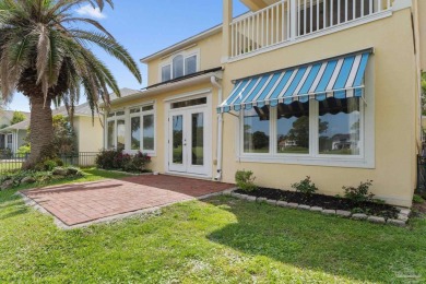 Luxury meets lifestyle in this stunning 3 bed, 3 bath, two-story on Tiger Point Golf and Country Club in Florida - for sale on GolfHomes.com, golf home, golf lot