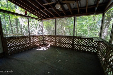Classic Pocono Lake chalet with endless potential! This on The Hideout Golf in Pennsylvania - for sale on GolfHomes.com, golf home, golf lot