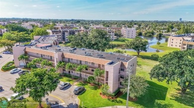 Totally remodeled 2/2 condo from top to bottom in Sunrise Lakes on Sunrise Lakes Phase IV Golf Course in Florida - for sale on GolfHomes.com, golf home, golf lot