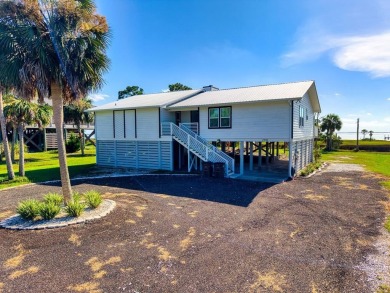 Completely remodeled and finished as of July 2025, this stunning on Saint Josephs Bay Country Club in Florida - for sale on GolfHomes.com, golf home, golf lot