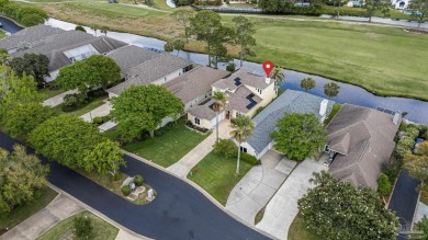 Luxury meets lifestyle in this stunning 3 bed, 3 bath, two-story on Tiger Point Golf and Country Club in Florida - for sale on GolfHomes.com, golf home, golf lot