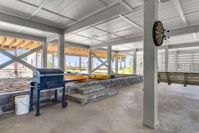 Completely remodeled and finished as of July 2025, this stunning on Saint Josephs Bay Country Club in Florida - for sale on GolfHomes.com, golf home, golf lot