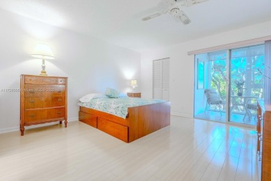 REDUCED! ***BEST VALUE IN WYNMOOR***IMPACT WINDOWS* WASHER/DRYER on Wynmoor Golf Course in Florida - for sale on GolfHomes.com, golf home, golf lot