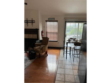 Wake up to lake views and easy living on Table Rock Lake. This on Holiday Island Executive Golf Course in Arkansas - for sale on GolfHomes.com, golf home, golf lot