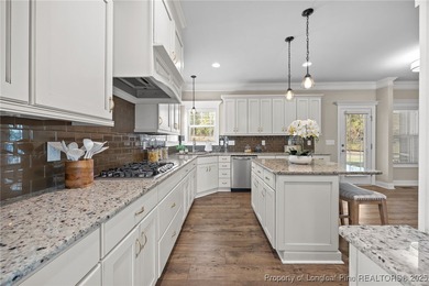 Welcome to this stunning executive-style custom home offering 5 on Kings Grant Golf and Country Club in North Carolina - for sale on GolfHomes.com, golf home, golf lot