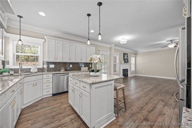 Welcome to this stunning executive-style custom home offering 5 on Kings Grant Golf and Country Club in North Carolina - for sale on GolfHomes.com, golf home, golf lot