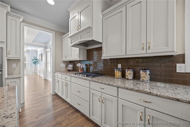 Welcome to this stunning executive-style custom home offering 5 on Kings Grant Golf and Country Club in North Carolina - for sale on GolfHomes.com, golf home, golf lot