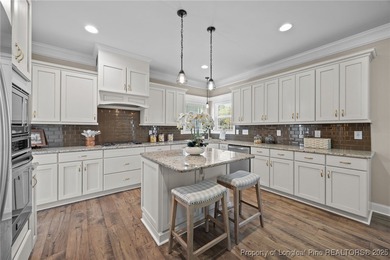 Welcome to this stunning executive-style custom home offering 5 on Kings Grant Golf and Country Club in North Carolina - for sale on GolfHomes.com, golf home, golf lot