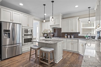 Welcome to this stunning executive-style custom home offering 5 on Kings Grant Golf and Country Club in North Carolina - for sale on GolfHomes.com, golf home, golf lot